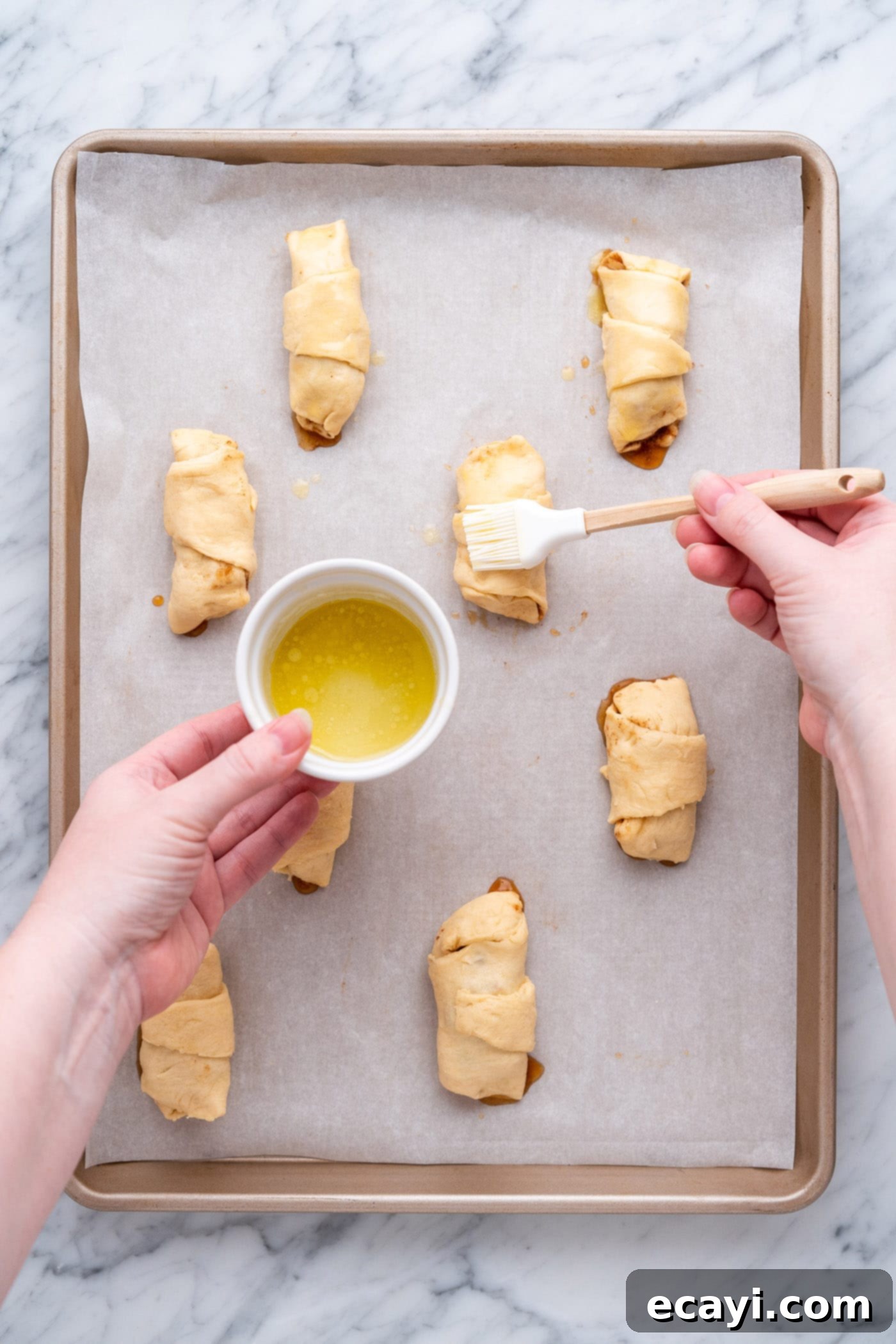Apple Pie Poppers 11 brushing apple pie bites with butter