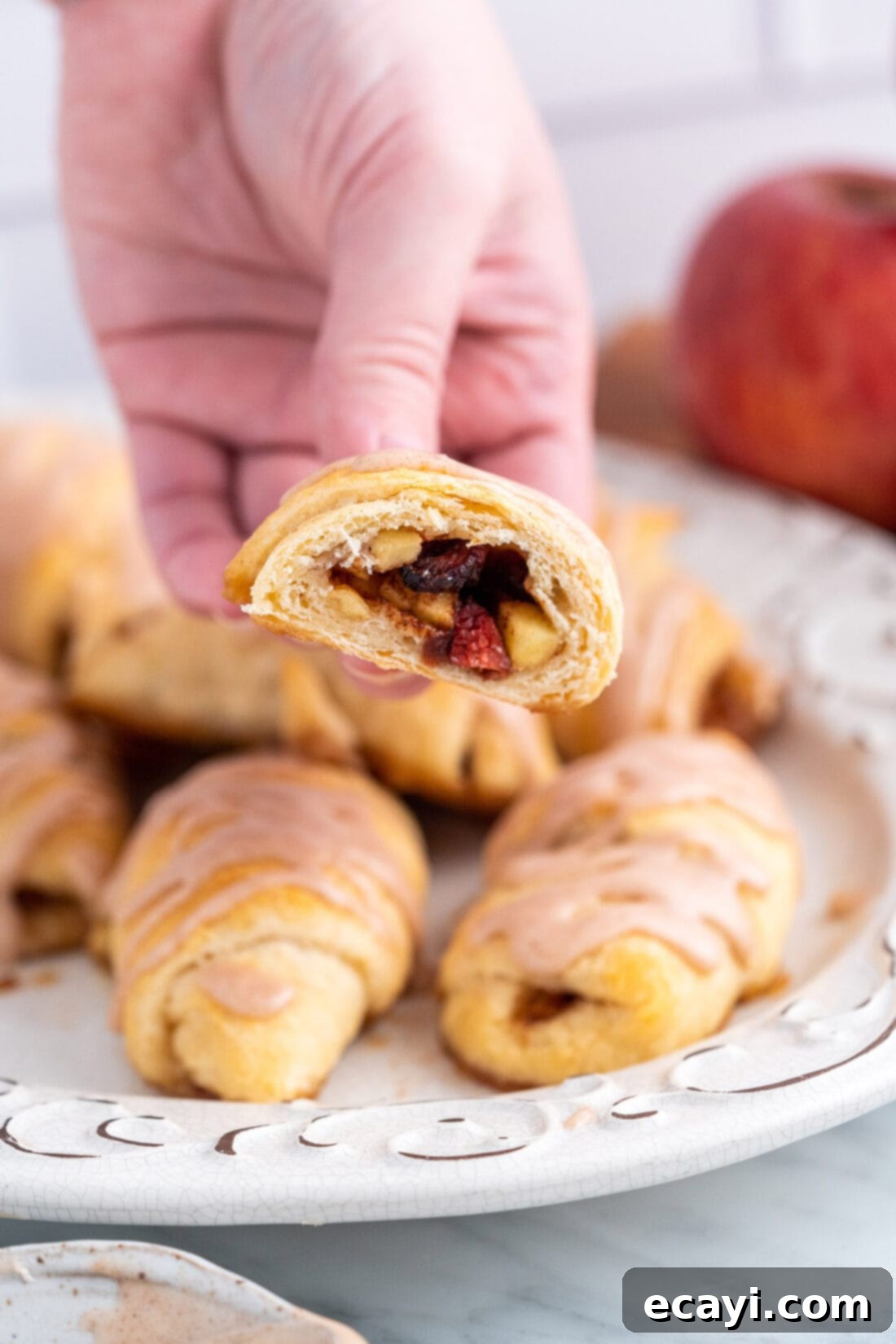 Apple Pie Poppers 13 hand holding an Apple Pie Bite