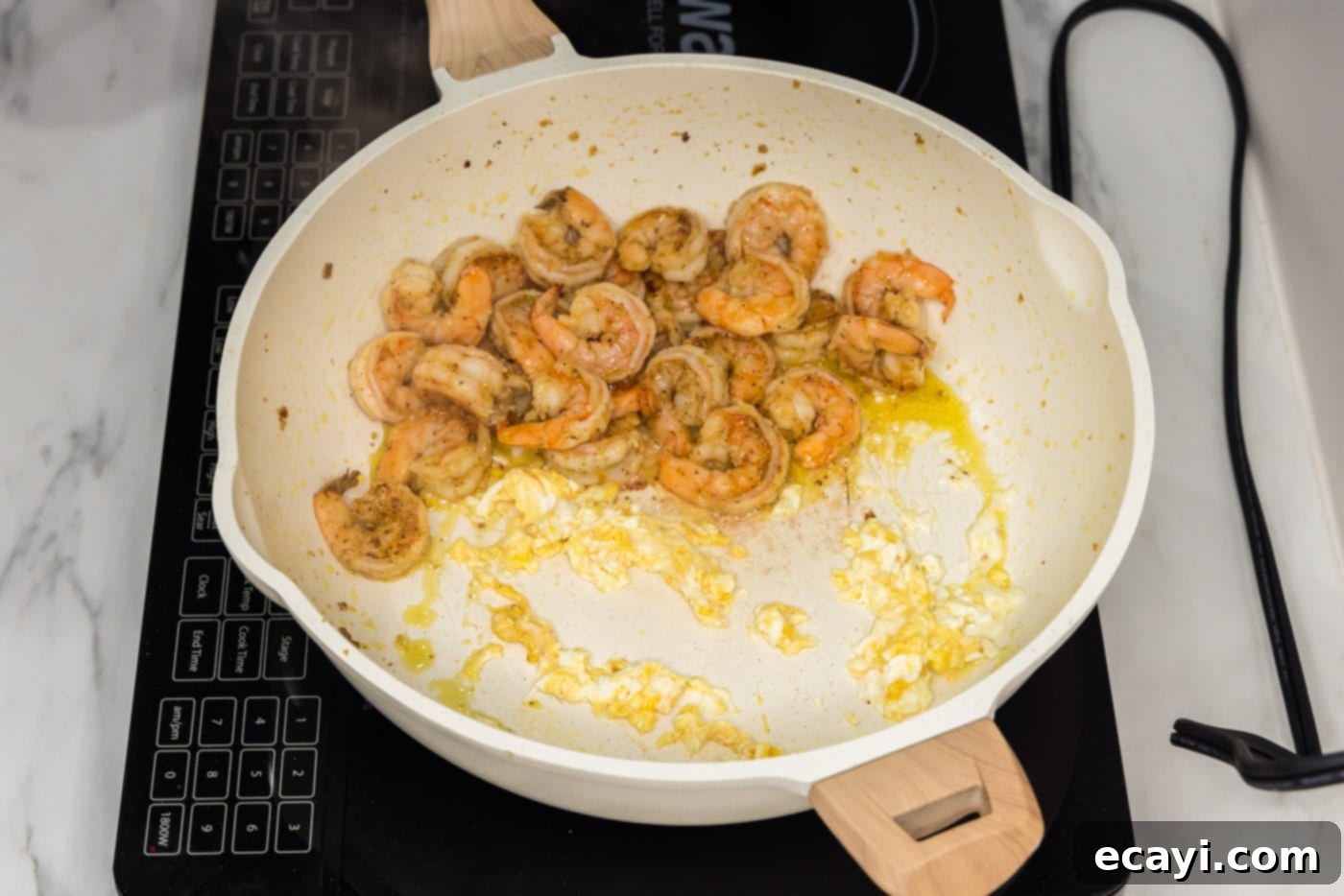 Authentic Shrimp Pad Thai 8 Scrambled egg mixed with shrimp in a skillet