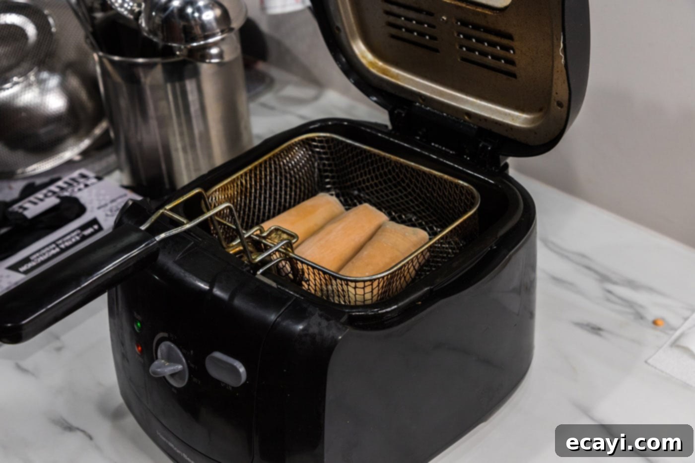 Ultimate Big Mac Egg Rolls 14 deep frying egg rolls in hot oil