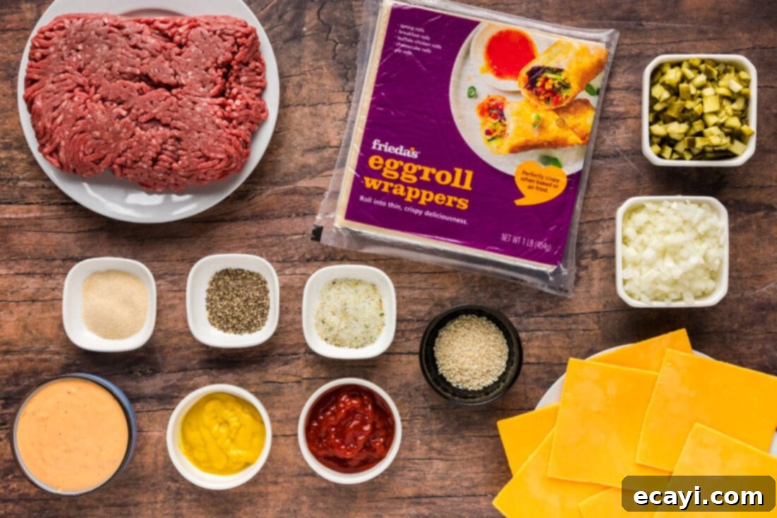 Ultimate Big Mac Egg Rolls 4 Ingredients laid out for Big Mac Egg Rolls, including ground beef, cheese, pickles, and egg roll wrappers