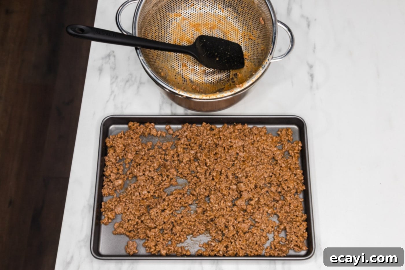 Ultimate Big Mac Egg Rolls 8 transferring ground beef mixture to a baking sheet to cool