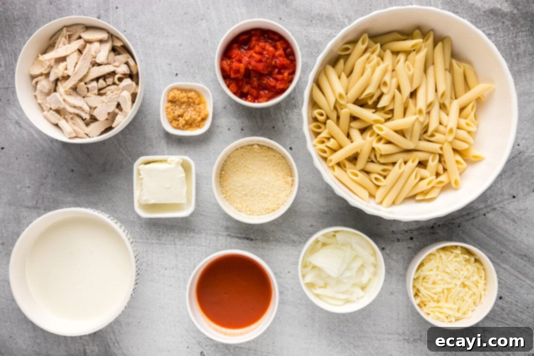 Zesty Buffalo Chicken Pasta 4 Various ingredients for Buffalo Chicken Pasta arranged on a counter
