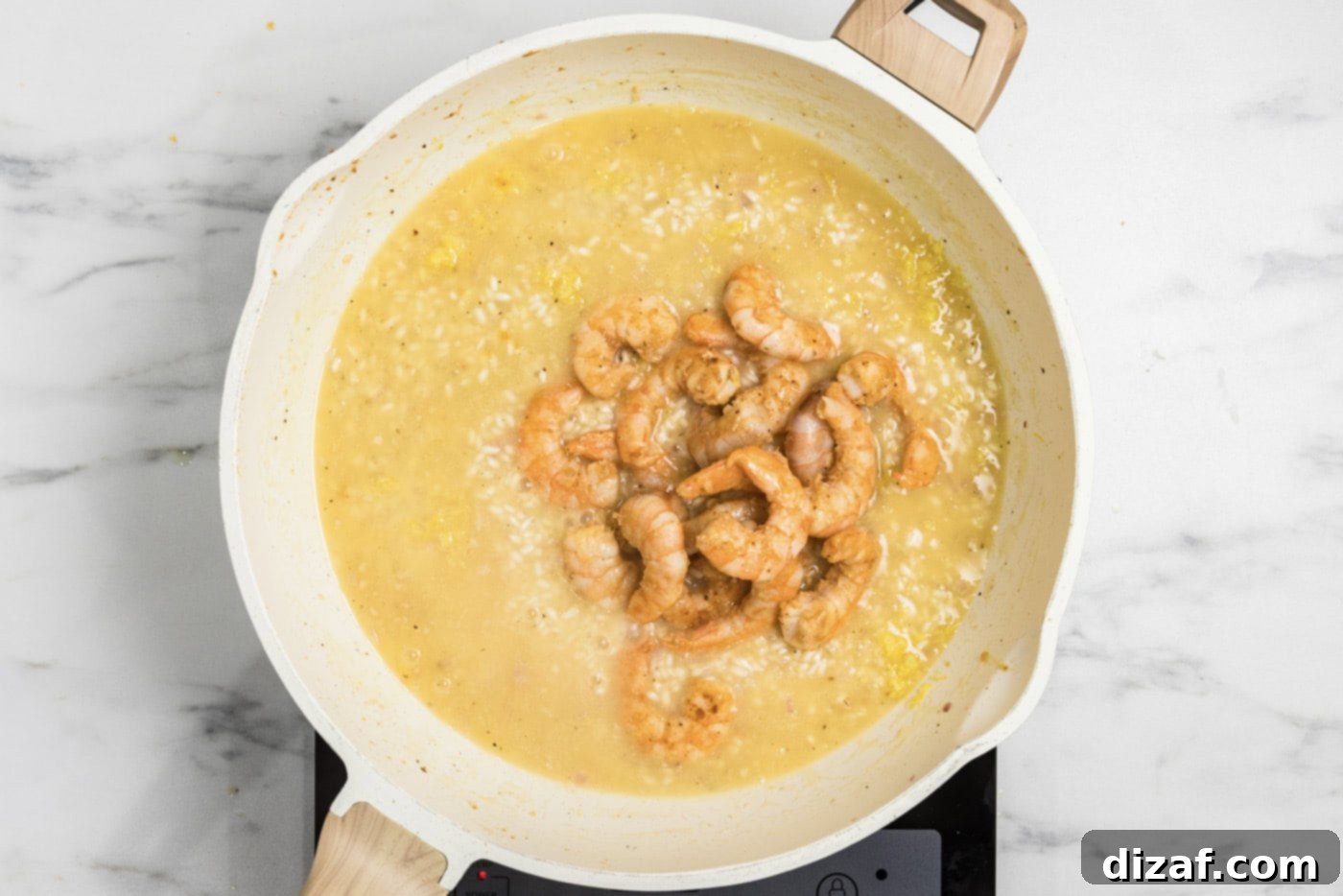 Creamy Shrimp Risotto 10 partially cooked shrimp added back to the skillet with risotto mixture