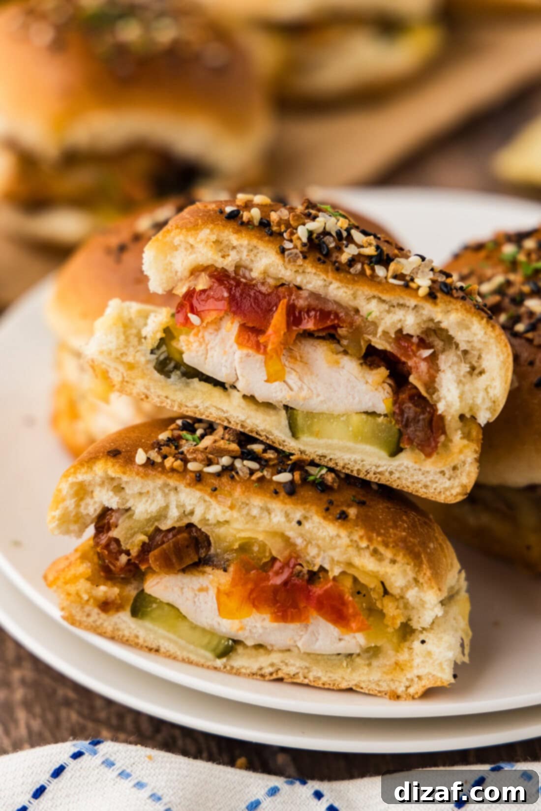 Gouda Chicken Bites 2 Gouda Chicken Sliders cut in half stacked on top of eachother