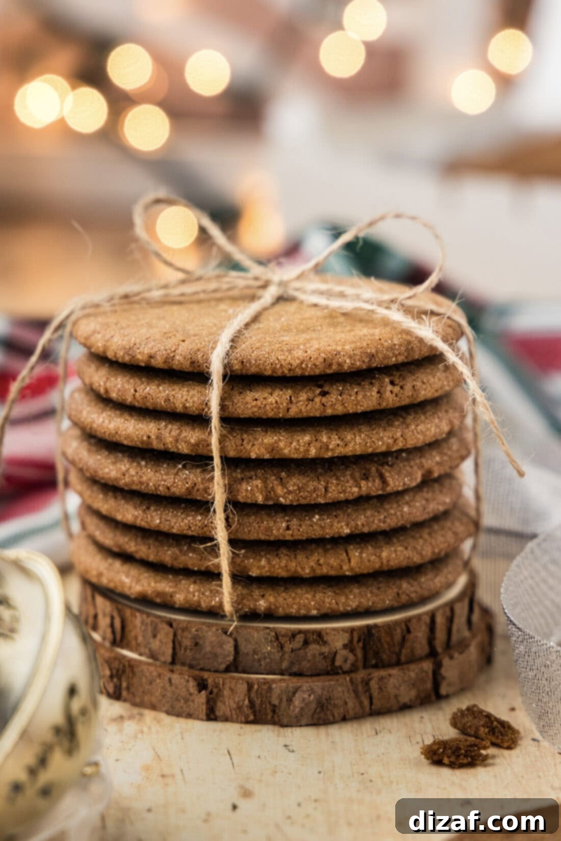 Stack of Crispy Gingersnap Cookies wrapped in twine