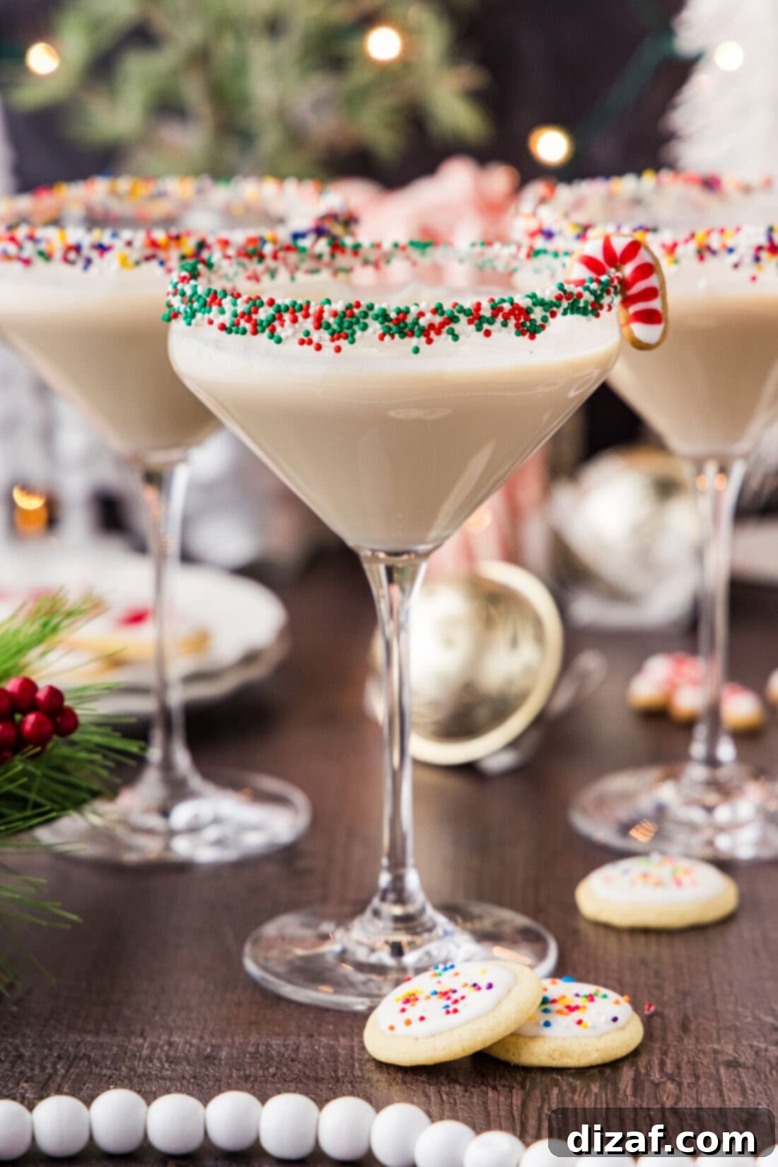 Three Sugar Cookie Martinis with mini sugar cookies next to them