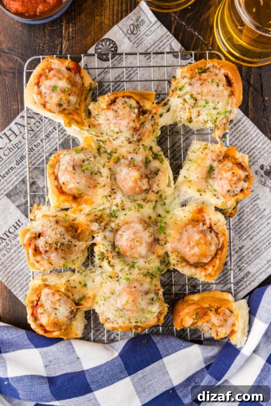 Meatball Sliders resting on a wire rack, ready to be served.