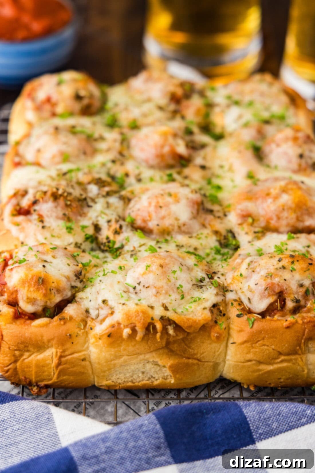 A close-up photo of delicious Meatball Sliders, ready to be enjoyed.