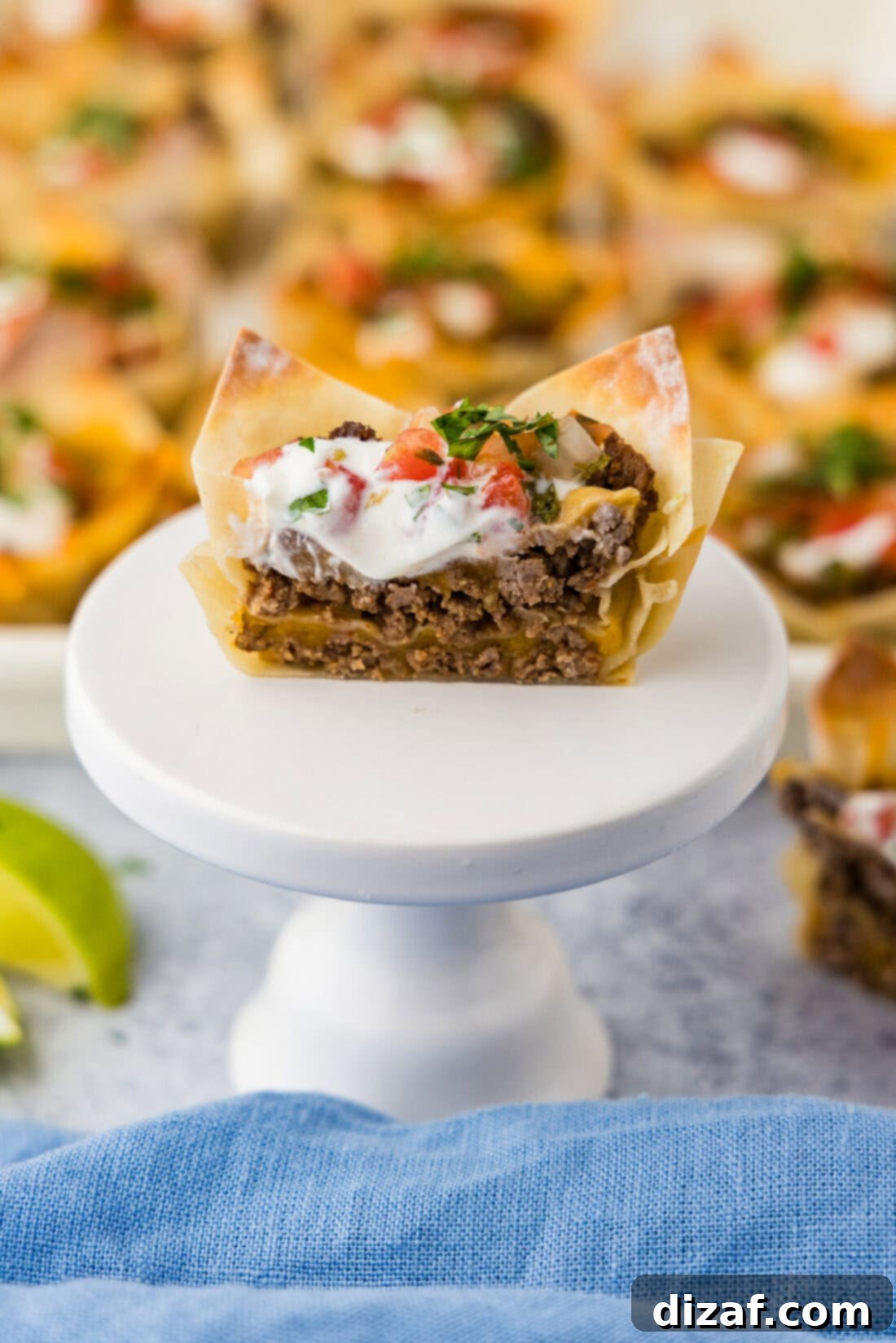 Taco Cup cut in half resting on a cupcake stand