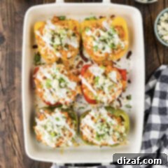 Baking dish of Buffalo Chicken Stuffed Peppers