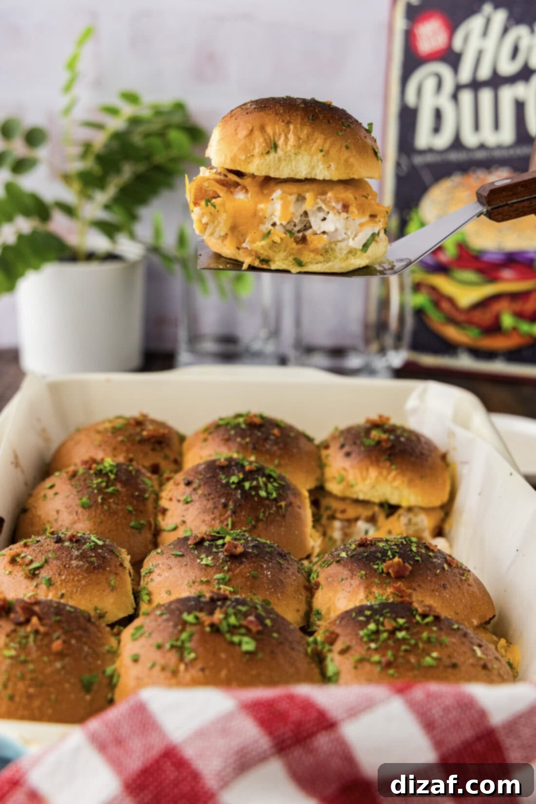 Chicken Bacon Ranch Slider held on spatula, ready to serve