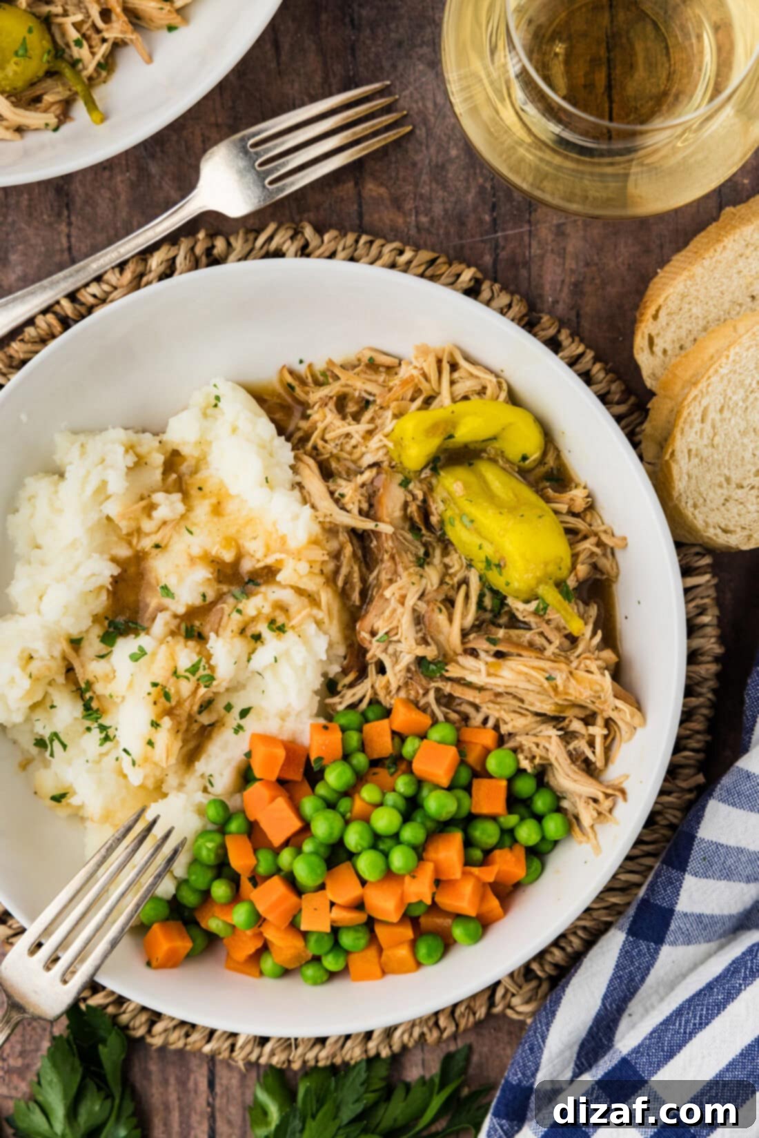 Bowl of Mississippi Chicken, mashed potatoes and veggies