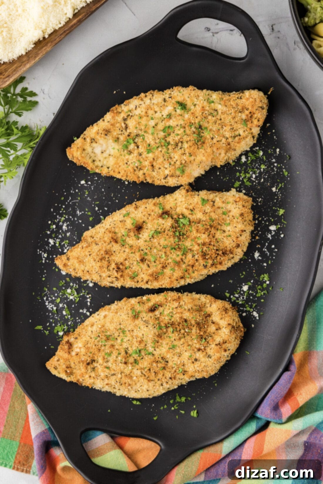 Parmesan-Crusted Chicken Perfection 2 Platter of three Parmesan Crusted Chicken breasts