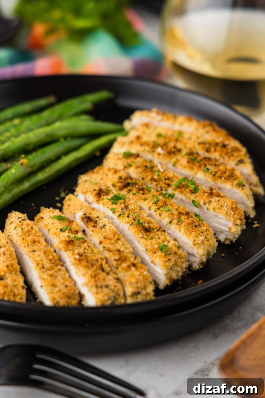 Parmesan-Crusted Chicken Perfection 8 Close up photo of slices of Parmesan Crusted Chicken