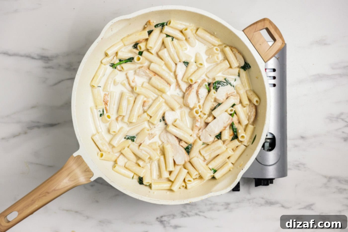 Garlic Chicken Pasta Sizzling Garlic Chicken Pasta Perfection 8 Creamy garlic chicken pasta in a skillet